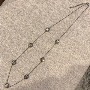 Long, adjustable, necklace with gold bead pendants